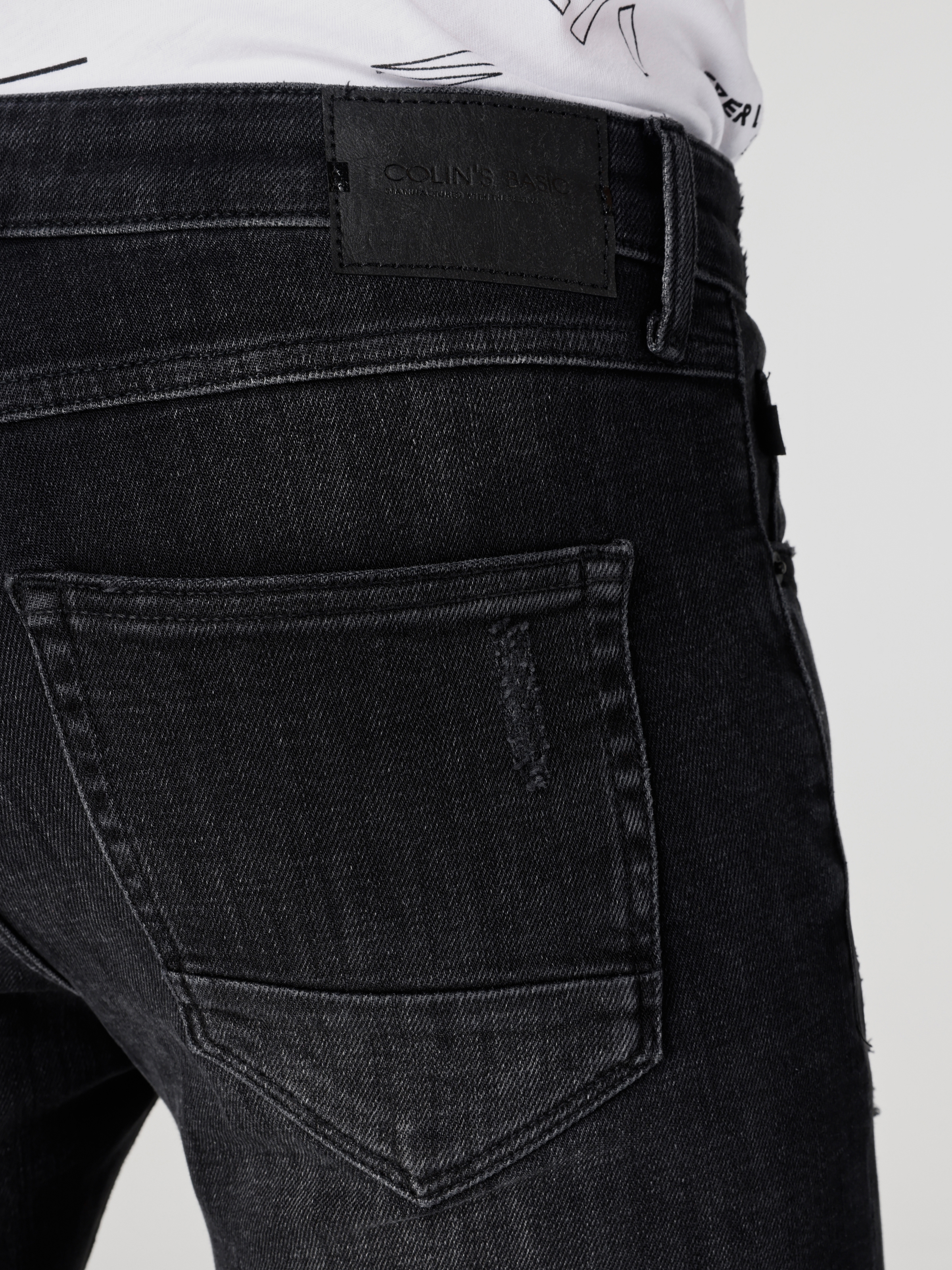 اعرض التفاصيل لـ 041 داني بنطال جينز ضيق منخفض الخصر وضيق الساق باللون الأسود للرجال