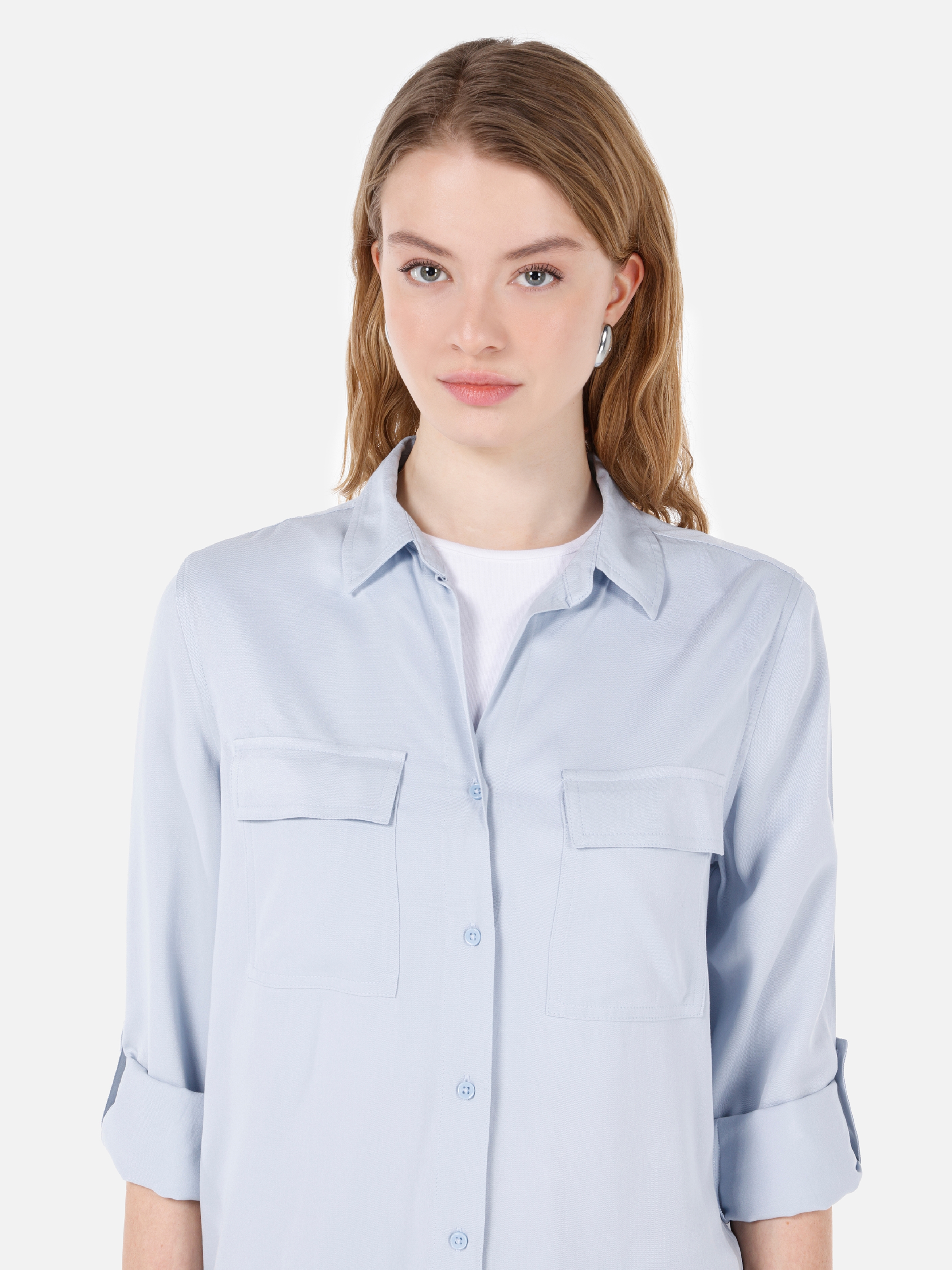 اعرض التفاصيل لـ قميص طويل الأكمام للنساء باللون الأزرق مع جيوب