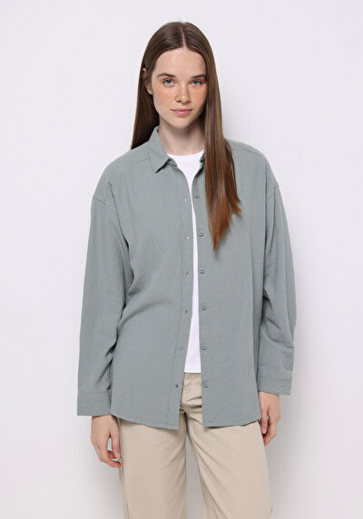 صورة من أخضر للنساء قميص كم طويل