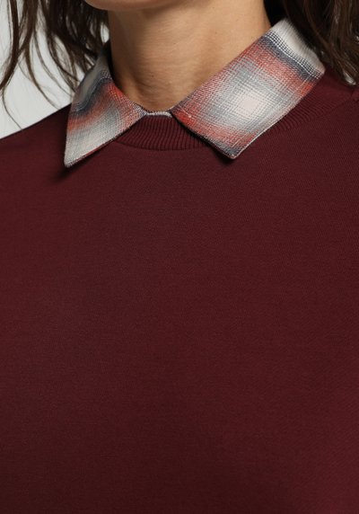 صورة من بوردو للنساء بلوز