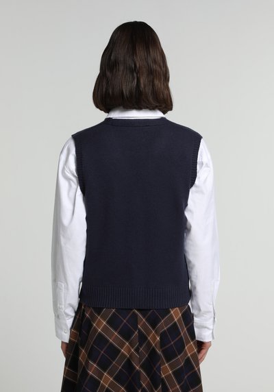 صورة من أزرق بحري للنساء كنزة