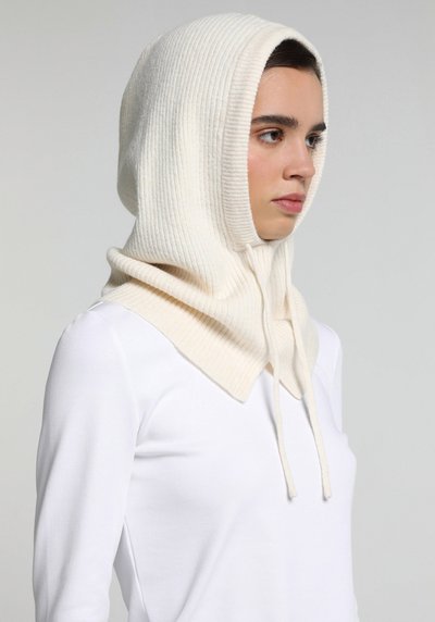 صورة من بيج فاتح للنساء بريه
