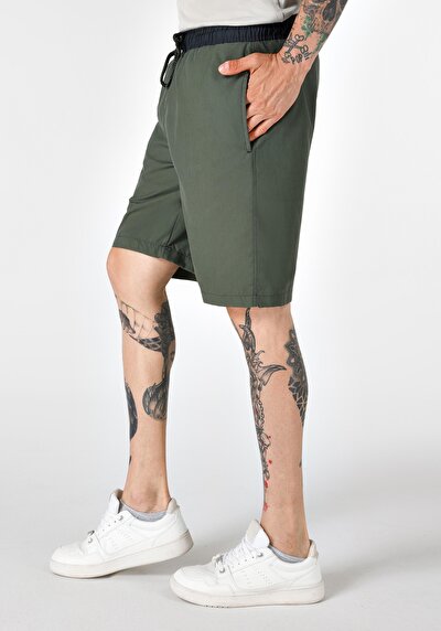 اعرض التفاصيل لـ شورت سباحة أخضر رجالي سليم فيت