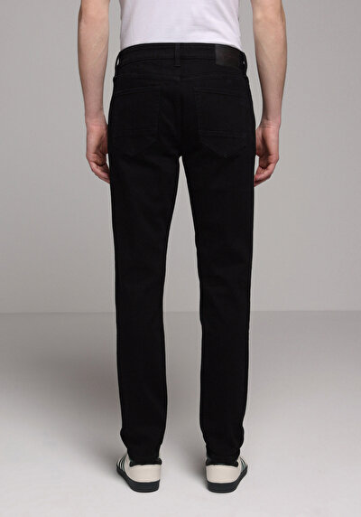 صورة من سليم خصر منخفض ساق ضيقة جينز أسود للرجال