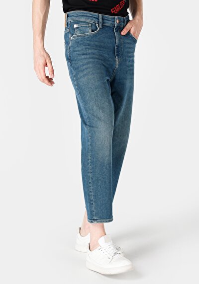 اعرض التفاصيل لـ فضفاض مريح بقصة قطرة المنشعب قصير الساق جينز نيلي للرجال