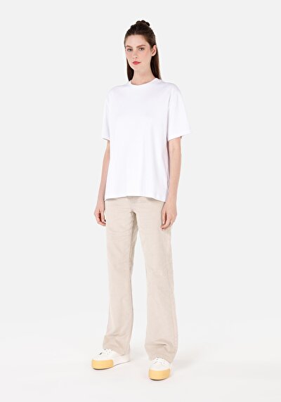 صورة من بيج فاتح للنساء بناطيل