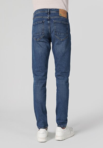 صورة من سليم خصر منخفض ضيق الساق جينز نيلي للرجال