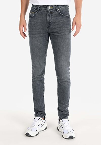 صورة من سليم خصر منخفض ضيق الساق الجينز الداكن للرجال