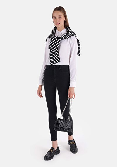 صورة من ضيق  ارتفاع الخصر ضيق الساق الجينز النسائي