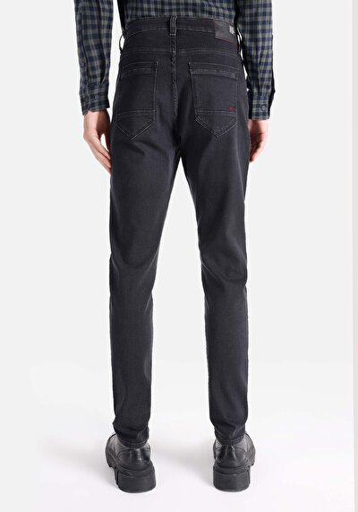 صورة من سليم خصر منخفض ساق ضيقة جينز أسود للرجال