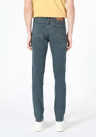 صورة من سليم خصر منخفض ضيق الساق الجينز الداكن للرجال