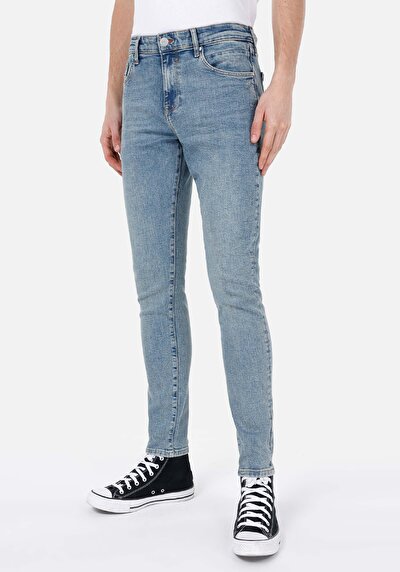 صورة من سليم خصر منخفض ضيق الساق جينز نيلي للرجال