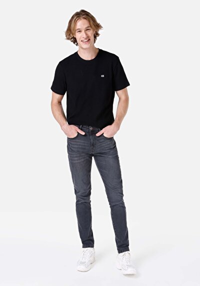 صورة من سليم خصر منخفض ساق ضيقة جينز أسود للرجال