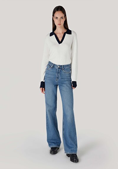 صورة من   جينز نسائي أزرق كحلي