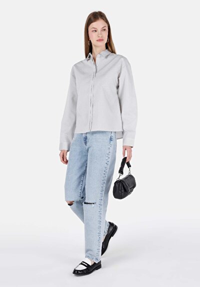 صورة من مستقيم الساق نسائي نيلي الجينز