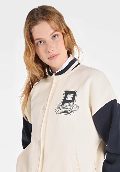 اعرض التفاصيل لـ   جاكيت أبيض نسائي مع قفل المفاجئ