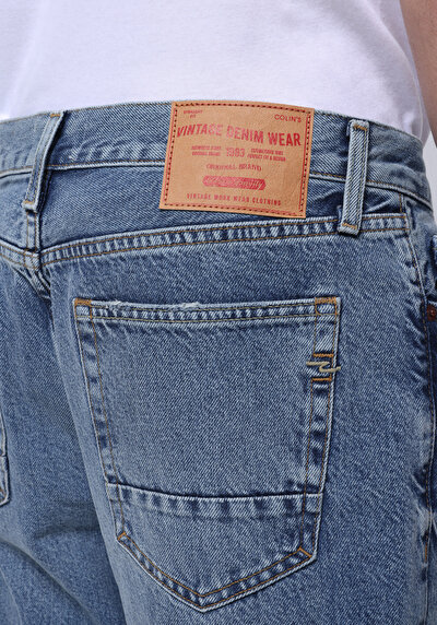 اعرض التفاصيل لـ فضفاض مدبب  جينز نيلي للرجال