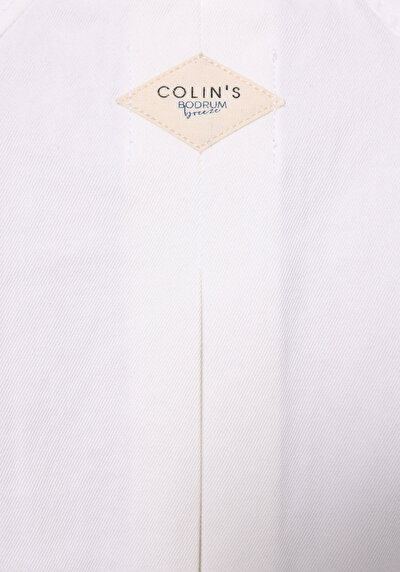 اعرض التفاصيل لـ سترة بيضاء نسائية بدون أزرار