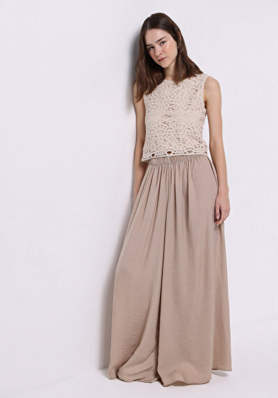 صورة من عادي مناسب بخصر عالي ساق واسعة بنطلون بيج نسائي