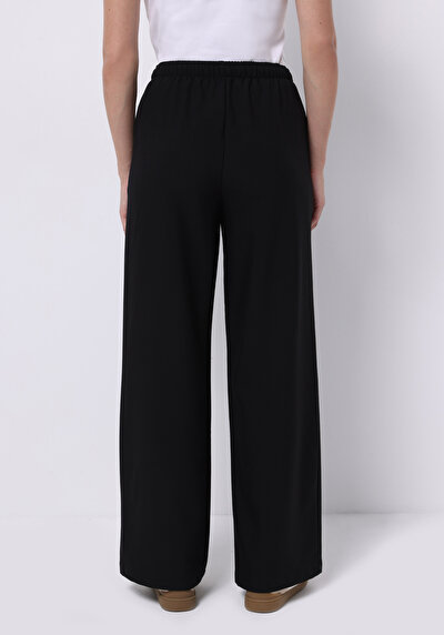 صورة من أسود للنساء بناطيل